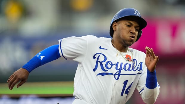 May 31, 2021; Kansas City, Missouri, USA; Kansas City Royals right fielder Edward Olivares (14) rounds third base to score against the Pittsburgh Pirates during the second inning at Kauffman Stadium. Mandatory Credit: Jay Biggerstaff-USA TODAY Sports